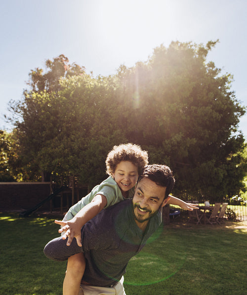 Father and son playing in the park