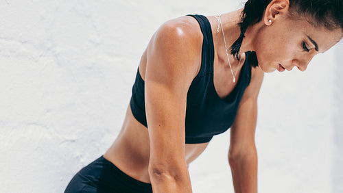 Close up of a female athlete doing workout