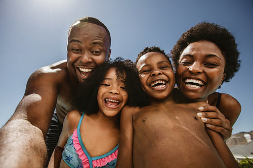 Family taking selfie outdoors