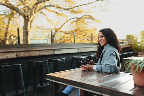 Woman sitting at a coffee shop