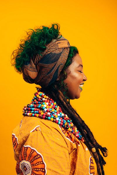 Young woman dressed in African clothing