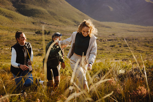 Friends hiking together in scenic nature