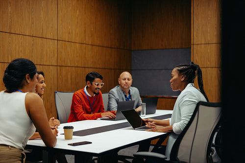 Diverse team engaged in a corporate business meeting