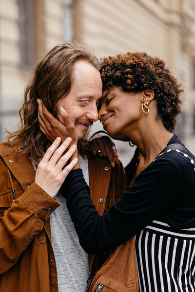 Affectionate embrace on a cozy city street