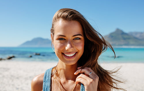 Beautiful young woman on the beach
