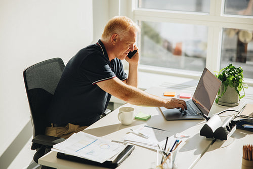 Mature CEO on a business call