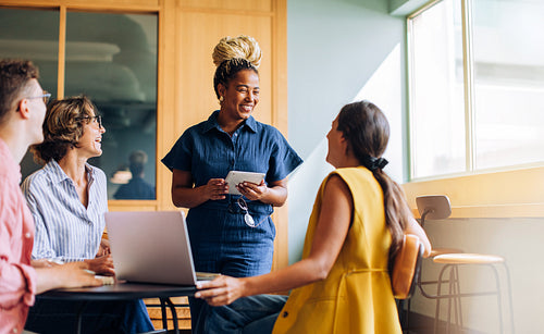 Diverse team having a meeting in a modern office setting