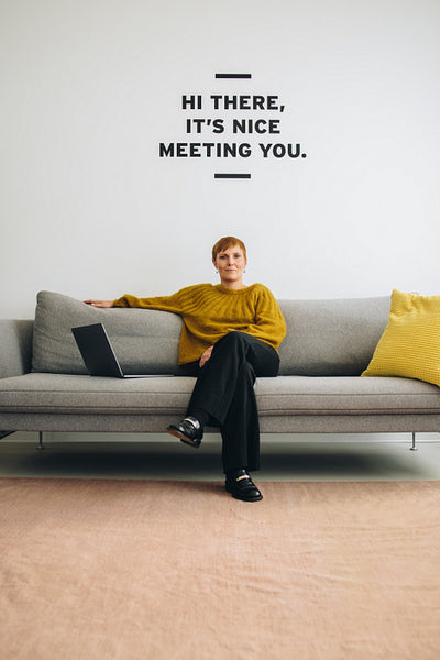 Female entrepreneur sitting in lobby