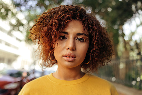 Closeup of a teenage girl looking at the camera