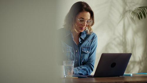 Businesswoman working efficiently at her office desk