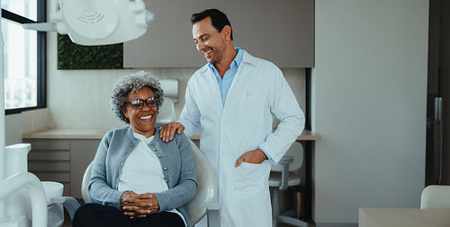 Professional dentist care helps a senior patient feel at ease in the clinic
