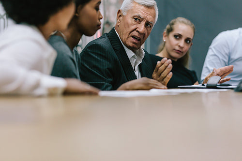 Business group having new project discussion in meeting