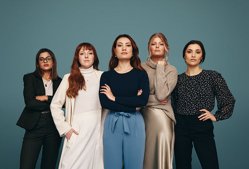 Millennial business women looking at the camera confidently