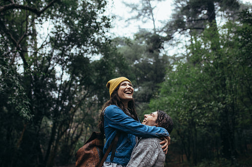Couple having great time together in rain