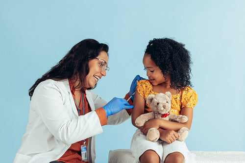 Girl getting flu shot