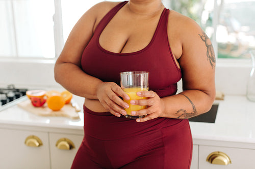 Healthy woman with glass of juice
