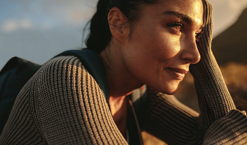 Woman relaxing after country walk