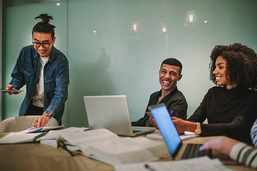 Group of multi-ethnic students studying together