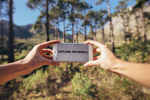 Close up of hands holding smart phone