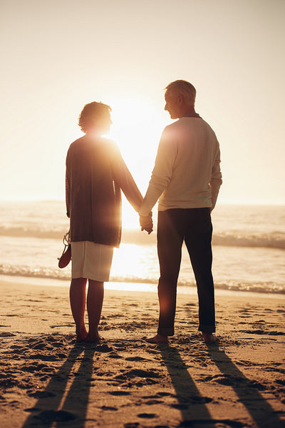 Loving senior couple relaxing by the sea