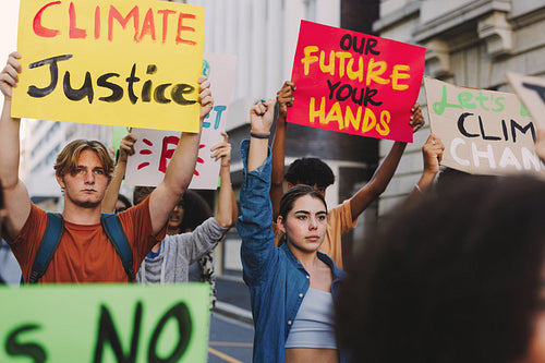 Young people marching against global warming in the city