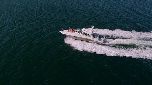 Friends relaxing on yacht deck