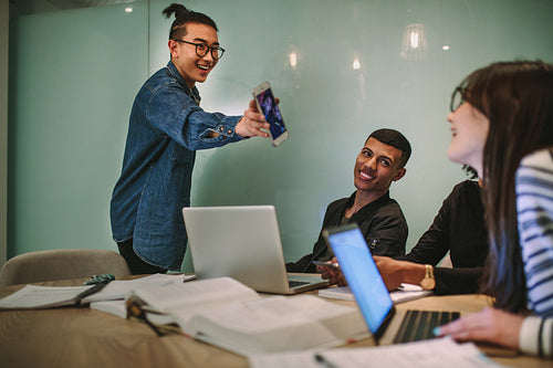 Group of students having fun at classroom