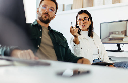 Interior designers having a discussion in an office