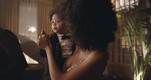 Mother and son dancing a gala night