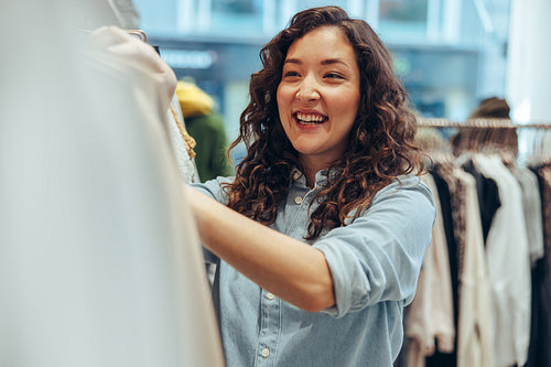 Woman enjoying clothes shopping
