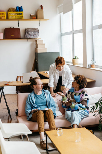 Colleagues collaborate in a modern co-working space