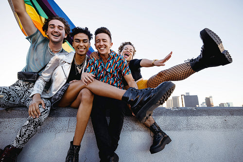 Four LGBTQ people celebrating pride together