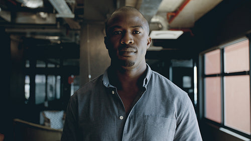 Positive young african businessman