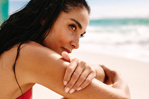Woman relaxing on the sea shore