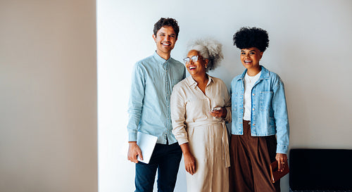 Team confidence: A diverse group prepares for the workday