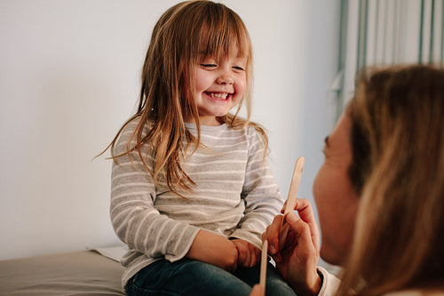 Cute girl visiting pediatrician for treatment