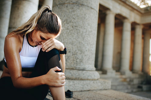 Fitness woman taking rest during workout