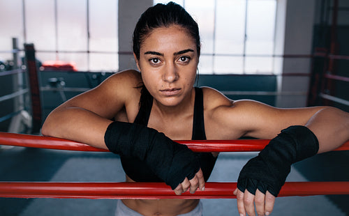 Female boxer inside a boxing ring