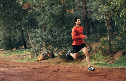 Athlete running in a park
