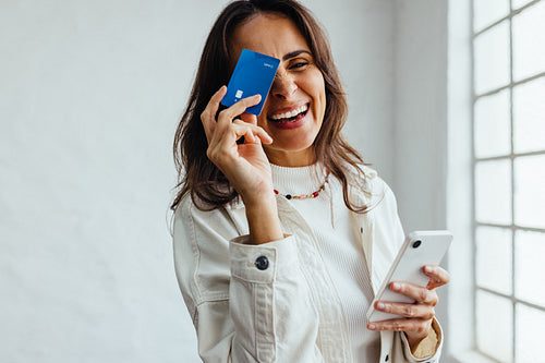 Business woman shopping online with a credit card