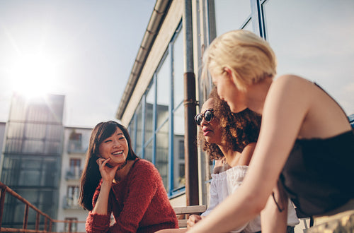Group of female friends in terrace cafe