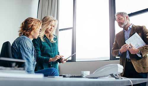 Business colleagues working in modern office