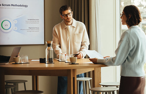 Business covers scrum planning during a meeting in the office with coworkers