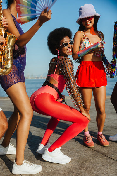 Carnaval dancers on a sunny beach celebration
