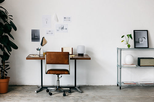 Home office workspace with an organized desk in a minimal interior