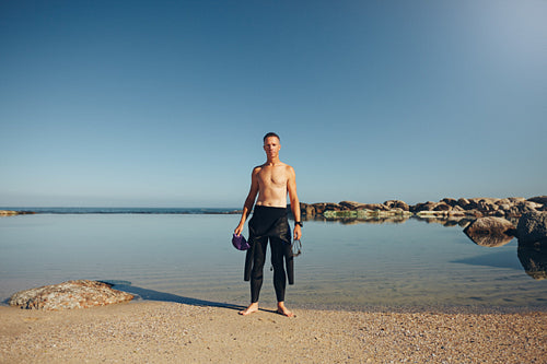 Young triathlete getting ready for a race