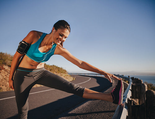 Female athlete getting ready for a run