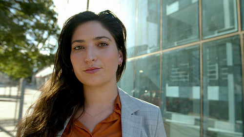 Female entrepreneur standing outside office building