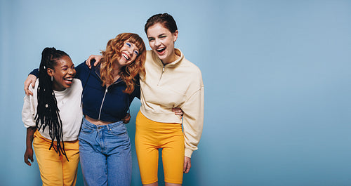 Girls having fun together in a studio