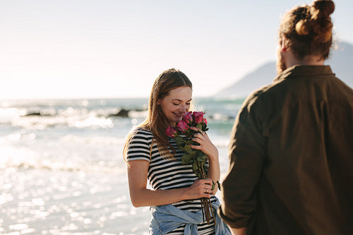 Affectionate couple on romantic date on beach